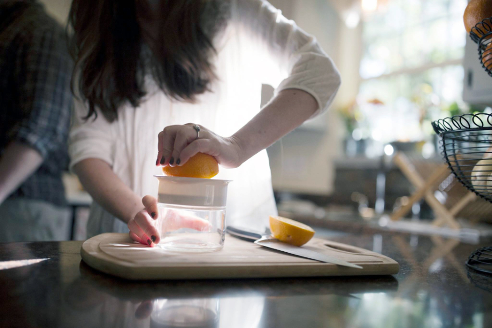 Cleaning a juicer in a kitchen